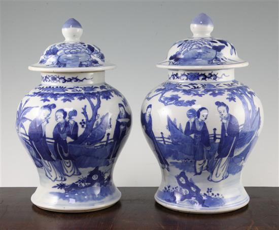 A pair of Chinese blue and white jars and covers, late 19th century, 28cm